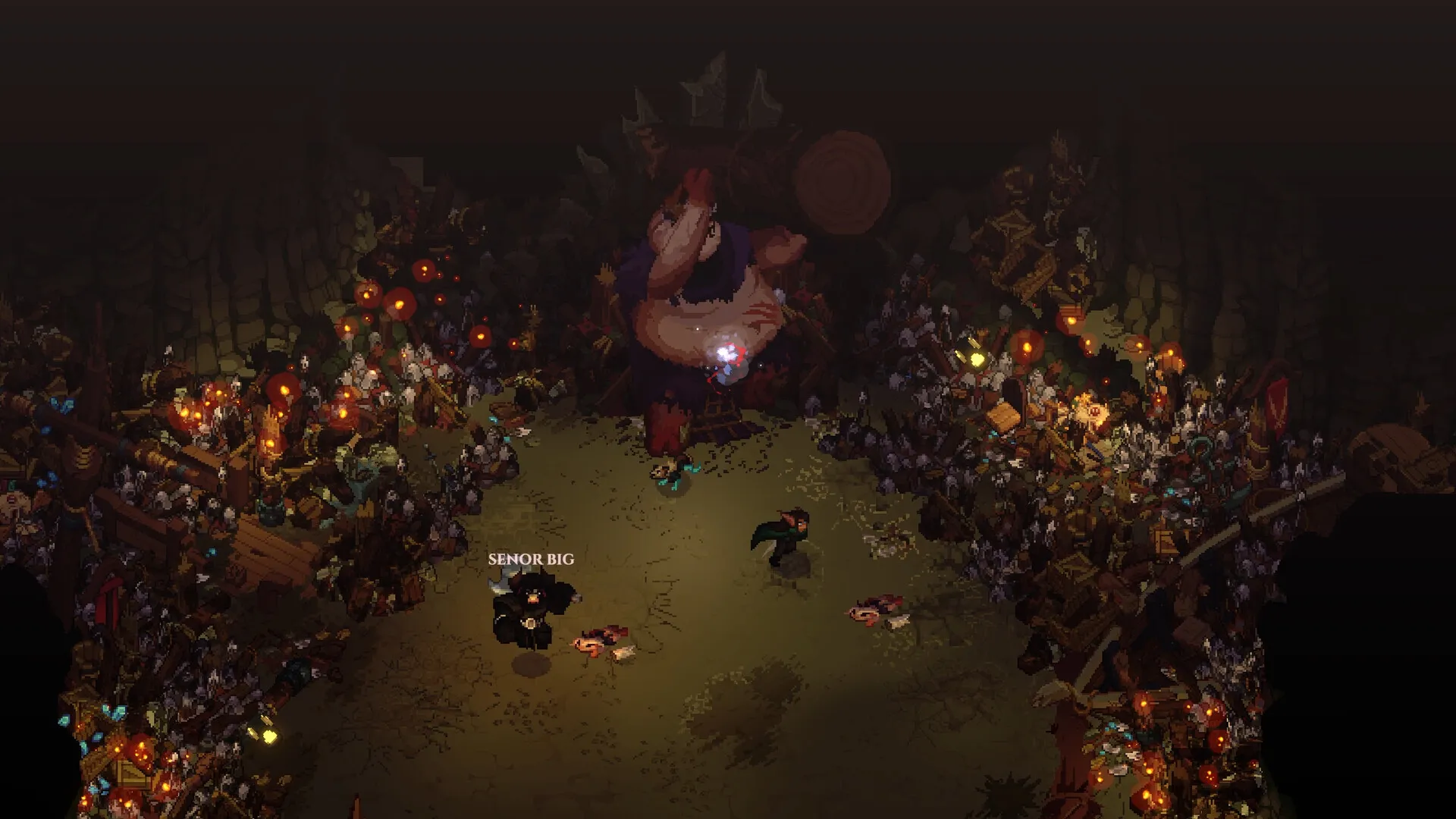 A large creature facing players in a cave arena lit by torches, one player labelled Senor Big.